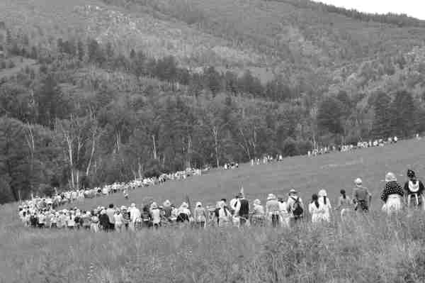 photo of youth passing through a mountain area on their first trek