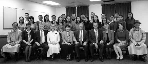 photo of elder and sister bednar with the service center employees